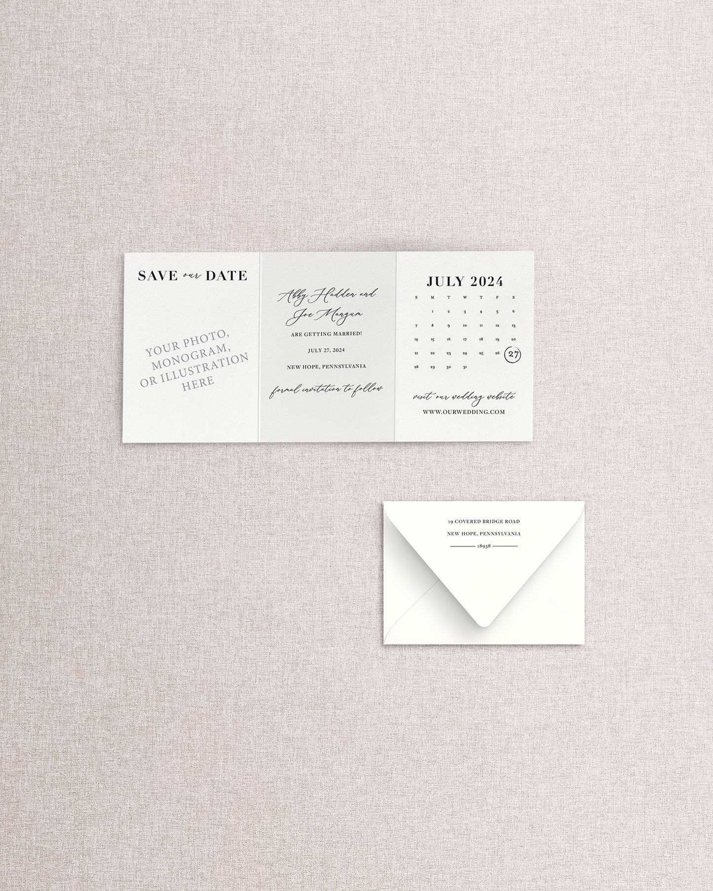 Wedding save-the-date card with envelope on a textured gray background