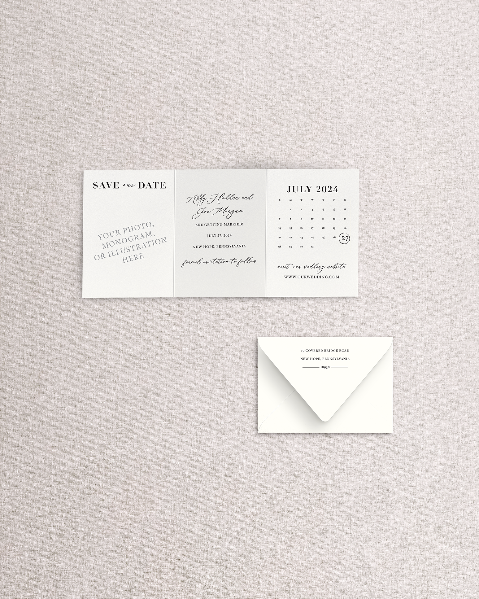 Wedding save-the-date card with envelope on a textured gray background