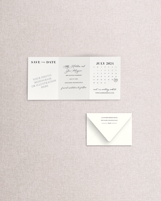 Wedding save-the-date card with envelope on a textured gray background