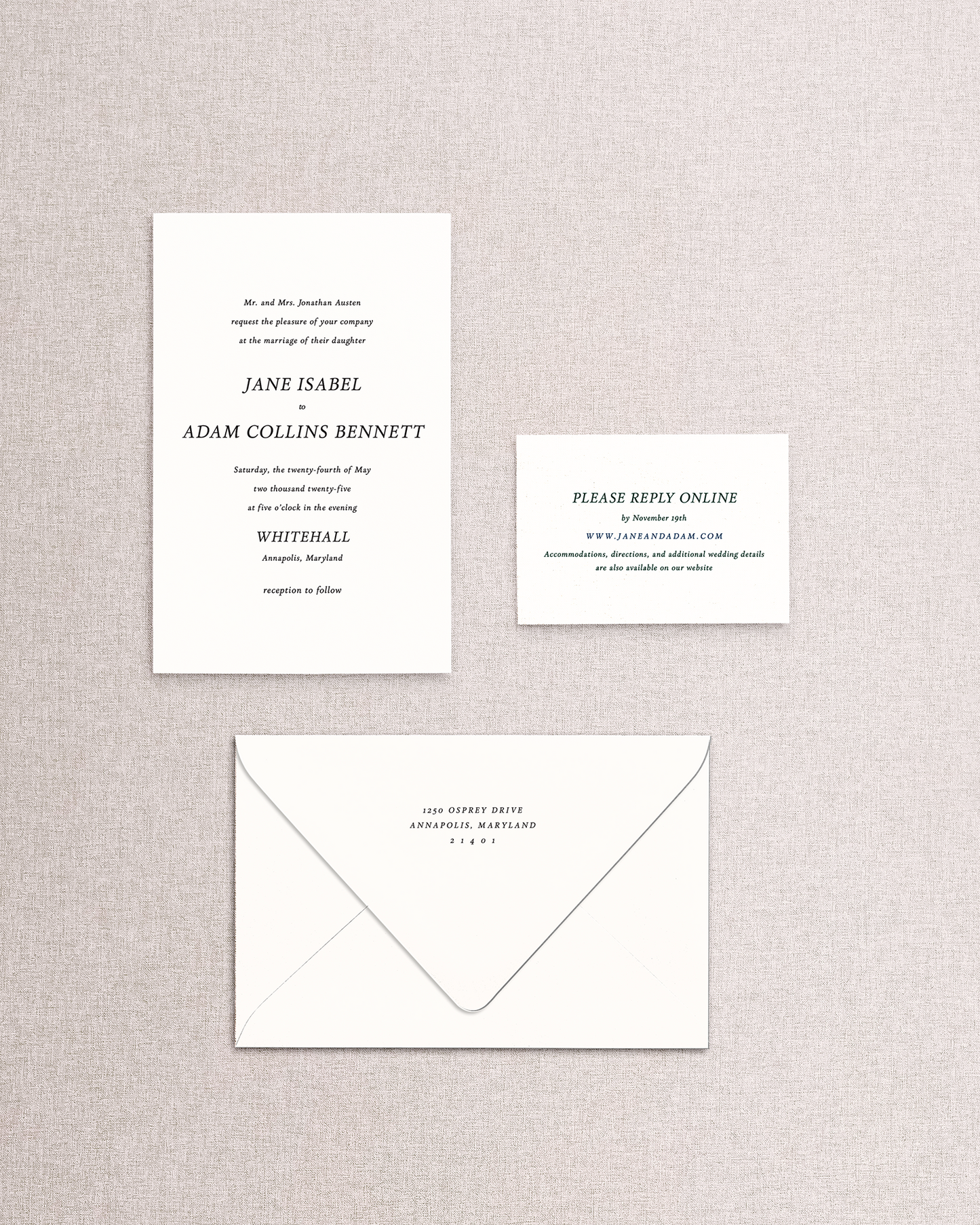 The Jane 3 piece wedding invitation suite in black and white on a beige background. An invitation suite with vintage text ready to be customized with color and design elements.