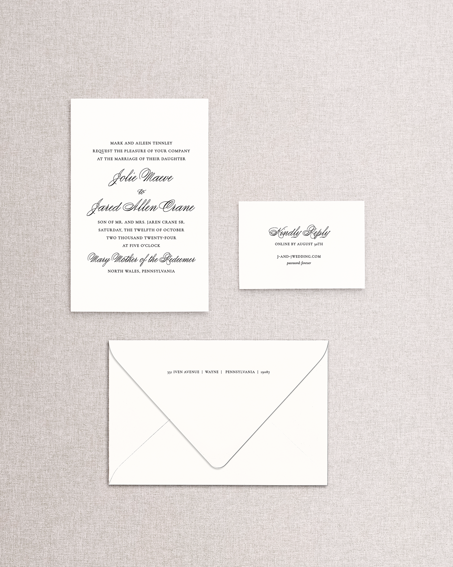 Wedding invitation set with envelope on a textured gray background