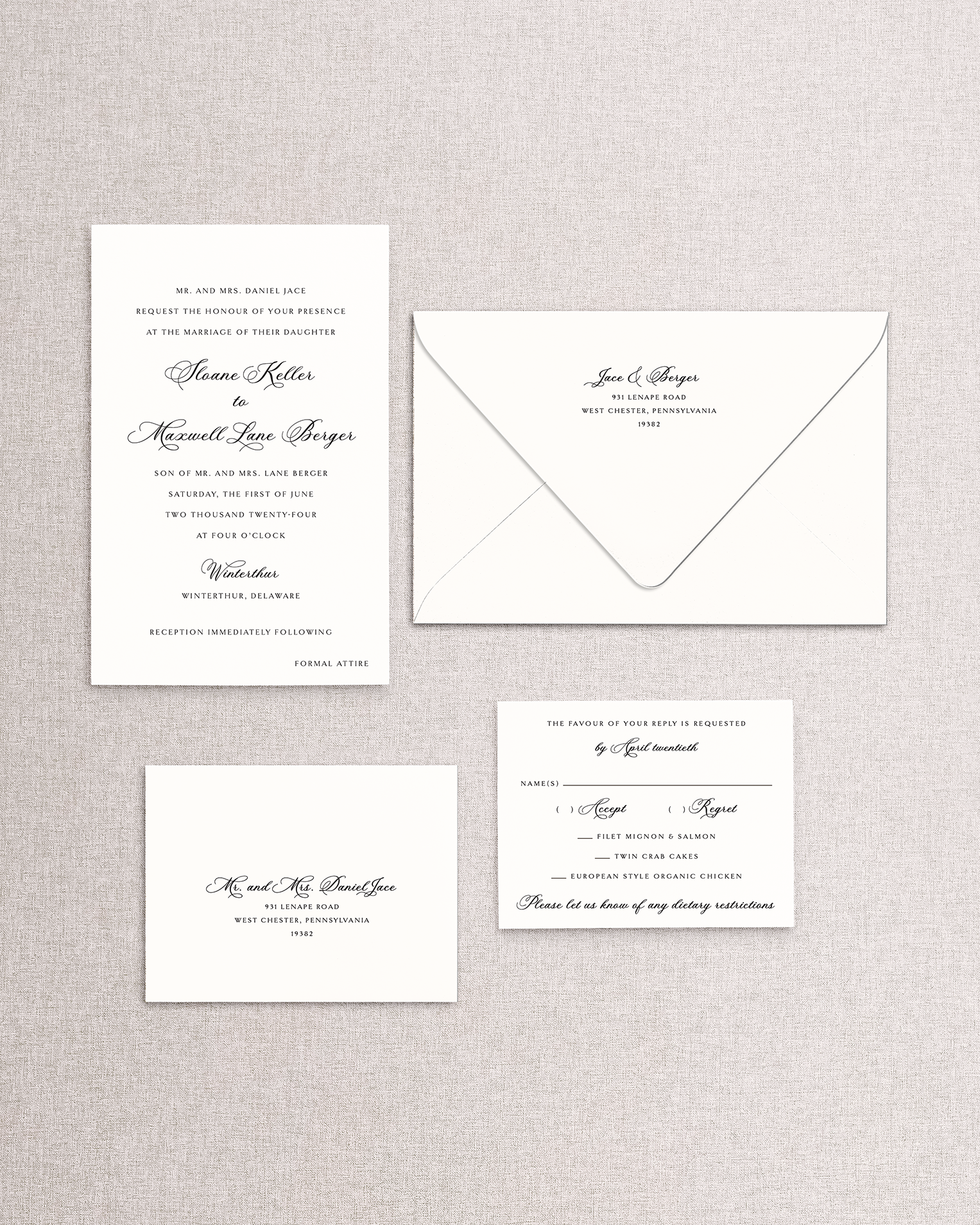 Set of wedding invitations and envelope and response card an envelope on a textured gray background. The 4 piece Sloane invitation suite from Stone Hill Paperie