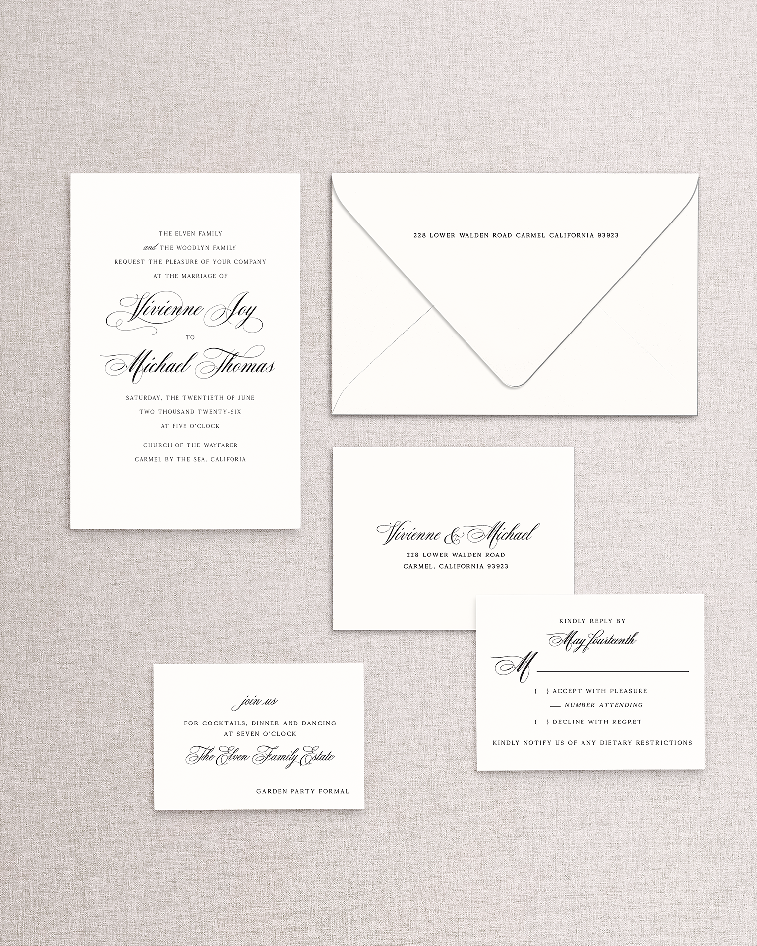 Set of wedding invitations,  reception card, and RSVP set on a textured gray background