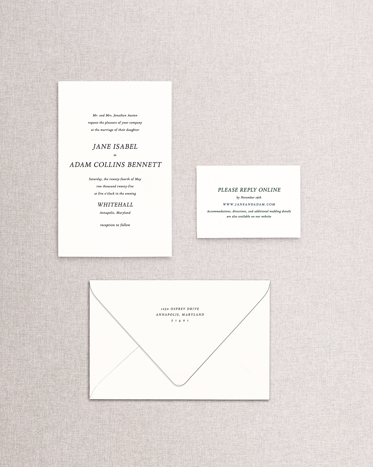 The Jane 3 piece wedding invitation suite in black and white on a beige background. An invitation suite with vintage text ready to be customized with color and design elements.