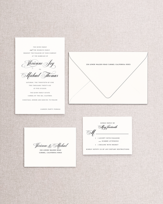 Set of formal wedding invitations with a matching envelope on a textured gray background