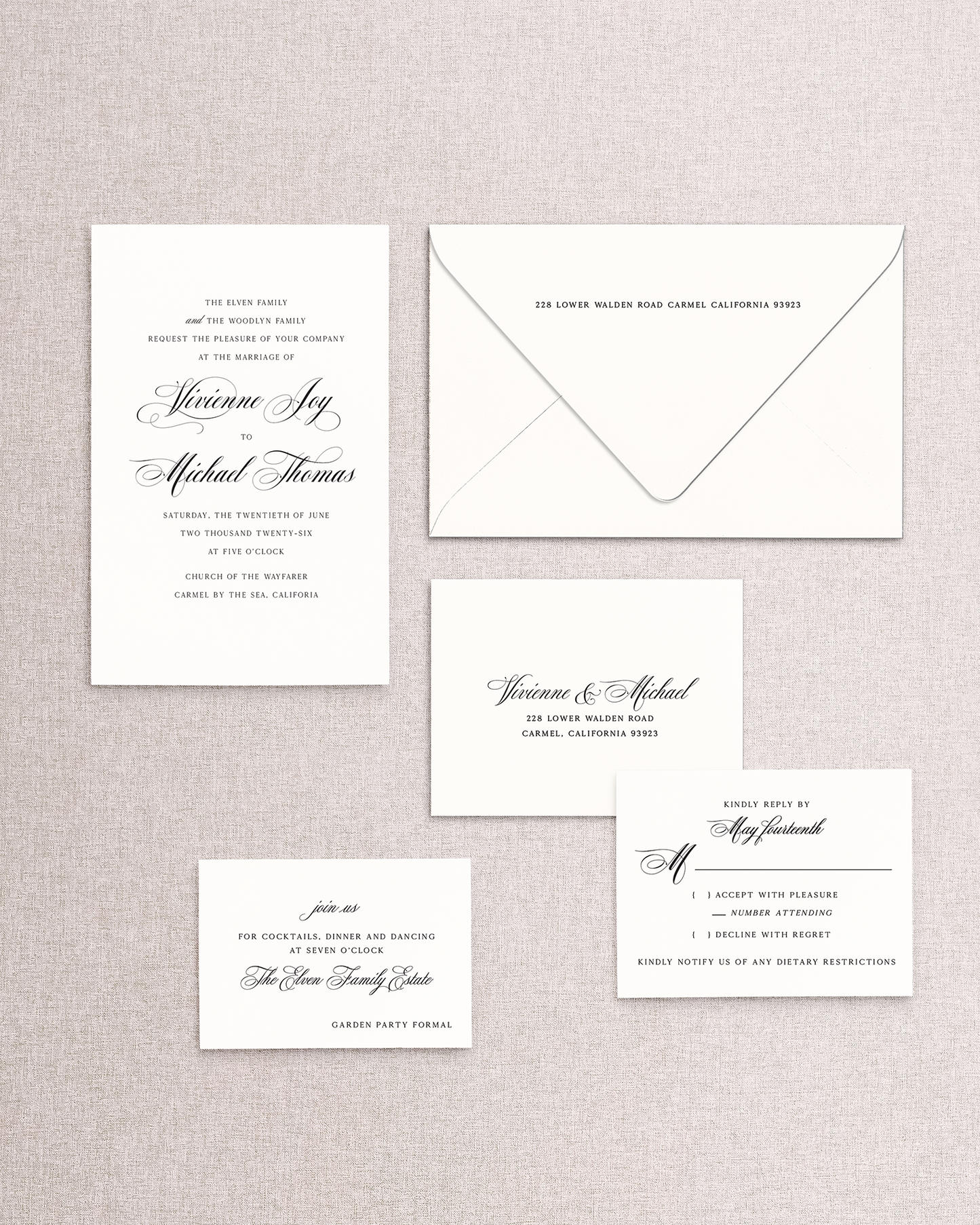 Set of wedding invitations,  reception card, and RSVP set on a textured gray background